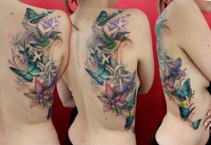 intimbereich blumen Tattoo