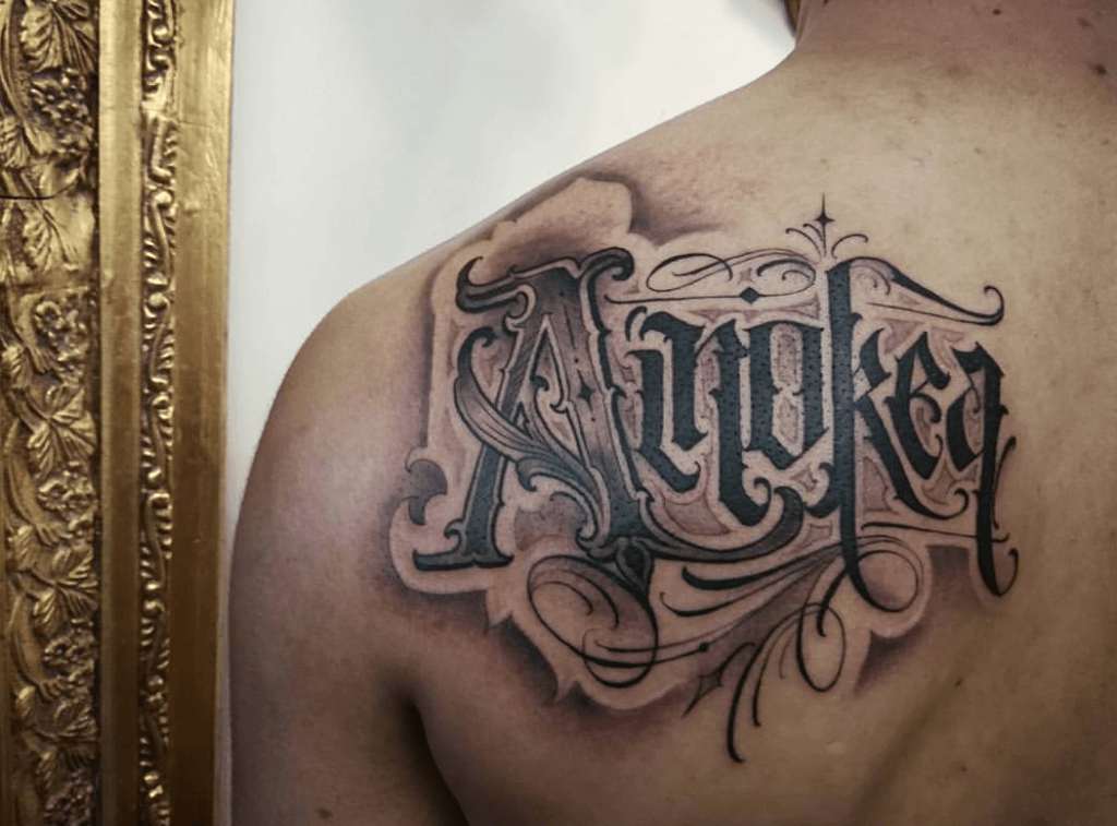 schrift tattoo Chicano