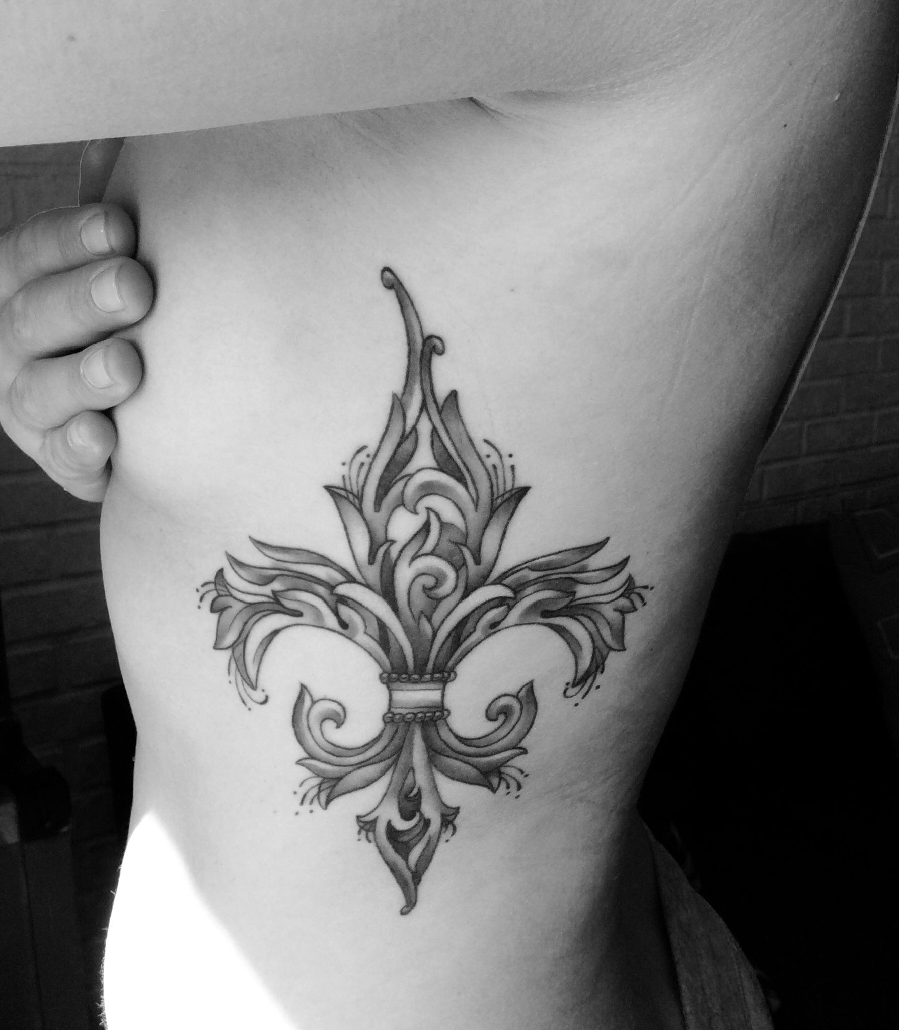 Tattoo fleur de lis bedeutung